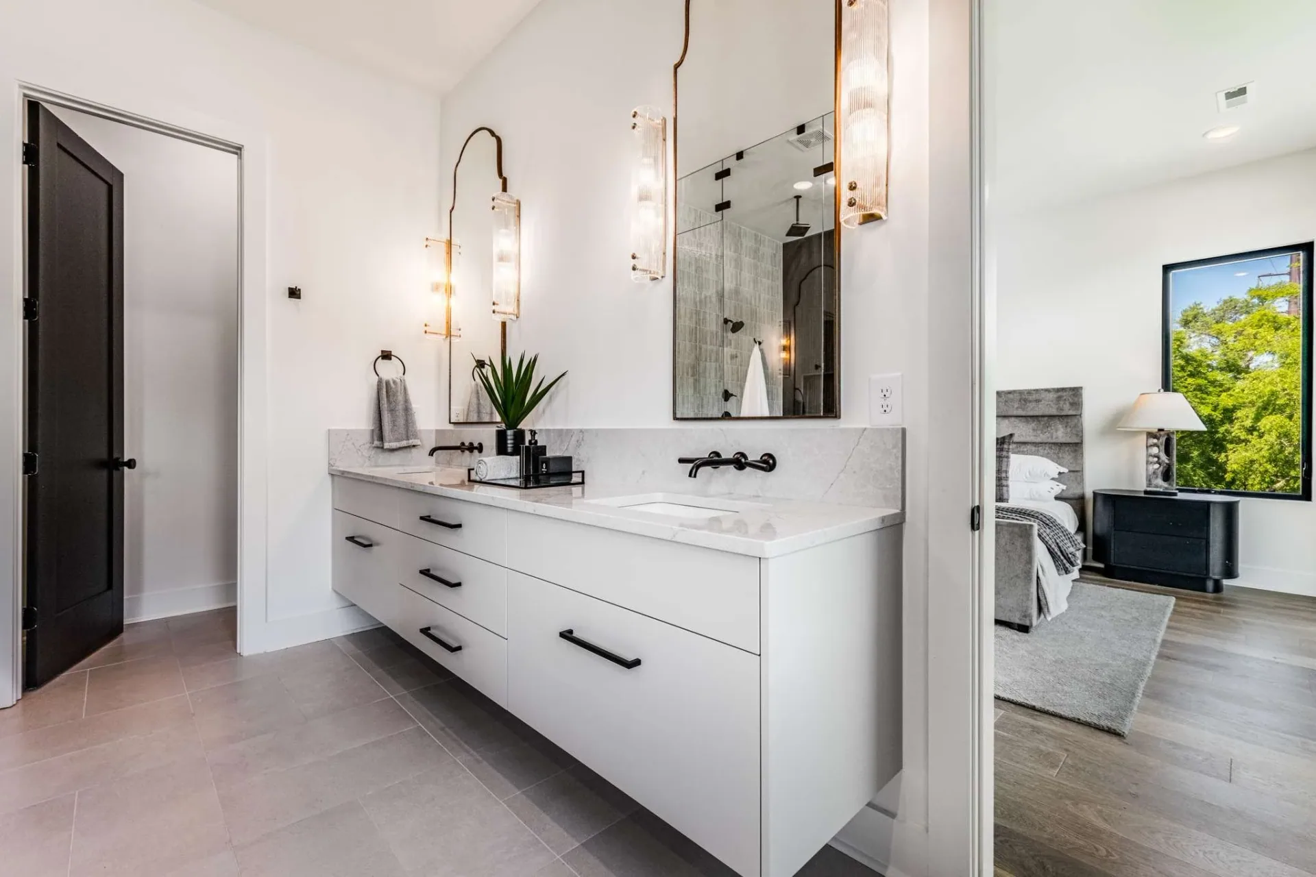 White double vanity with tall mirrors